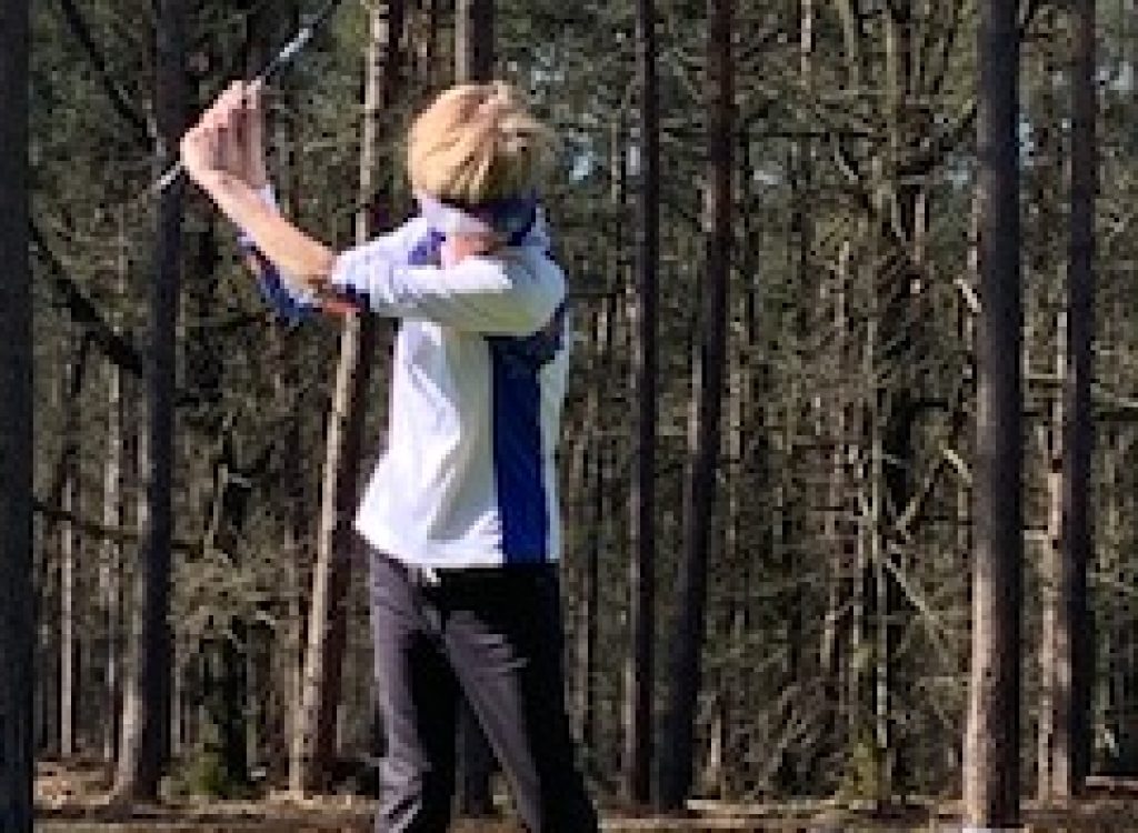 Olivette-playing-golf